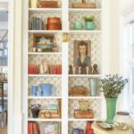 Bookcase filled with blue and green Bauer pottery | Girlfriend is Better