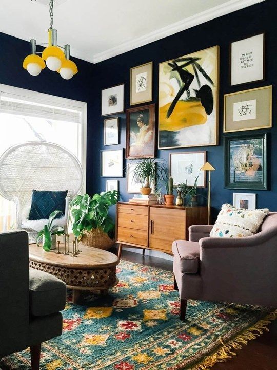 Create a large gallery wall on dark paint to lower intensity in the room | Girlfriend is Better