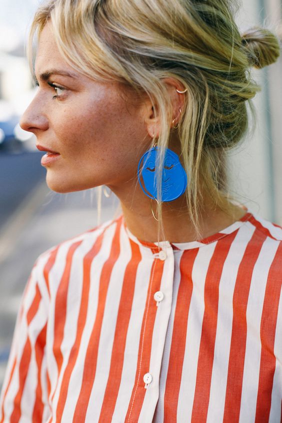 Statement earring and bold striped blouse in yellow and orange for Spring | Girlfriend is Better