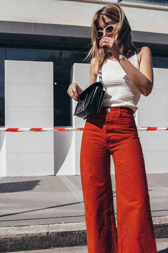 Flared high-rise pants in yellow and orange for spring and summer fashion | Girlfriend is Better