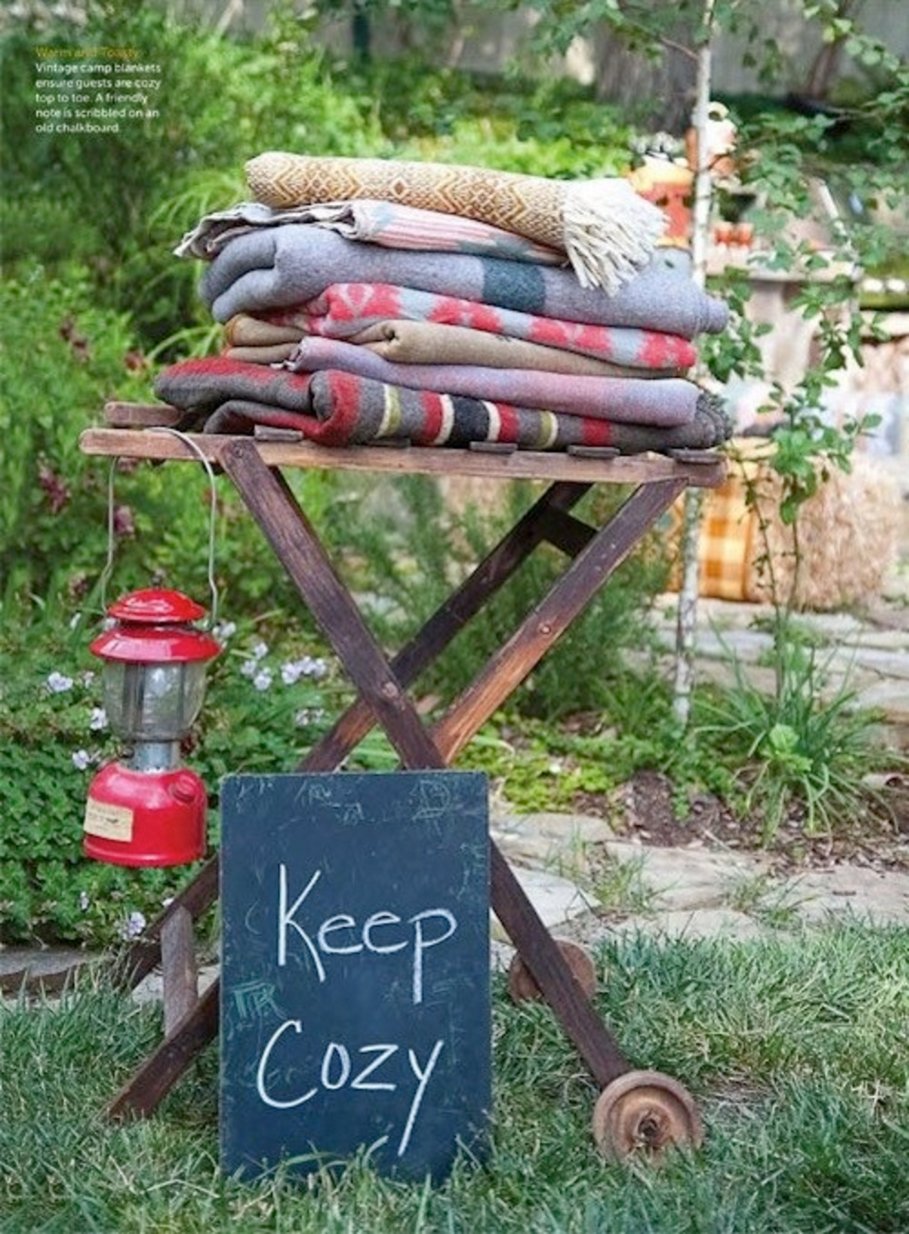 Cozy blankets as patio party decor | Girlfriend is Better