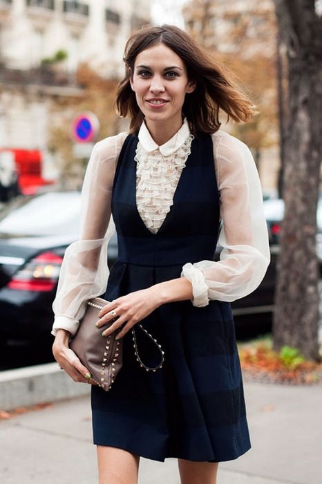 Alexa Chung in a ruffled tuxedo blouse and dark pinafore dress | Pinafores + Overalls | Girlfriend is Better