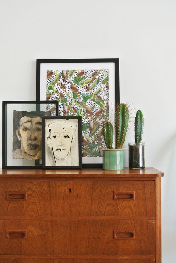 Charcoal portraits of random men on mid-century dresser | Girlfriend is Better