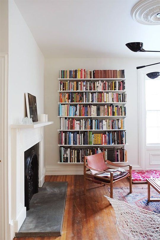 Track shelves are versatile open shelving for library wall | Girlfriend is Better