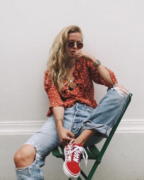 Skate style with Vans low tops, ripped boyfriend jeans, and blouse with ruffles | Girlfriend is Better