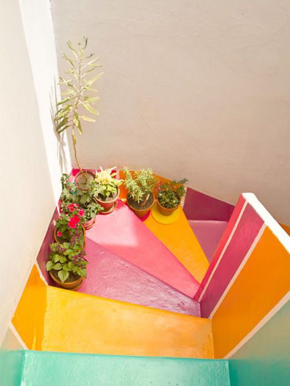 Rainbow stairway in well lit hall | Girlfriend is Better