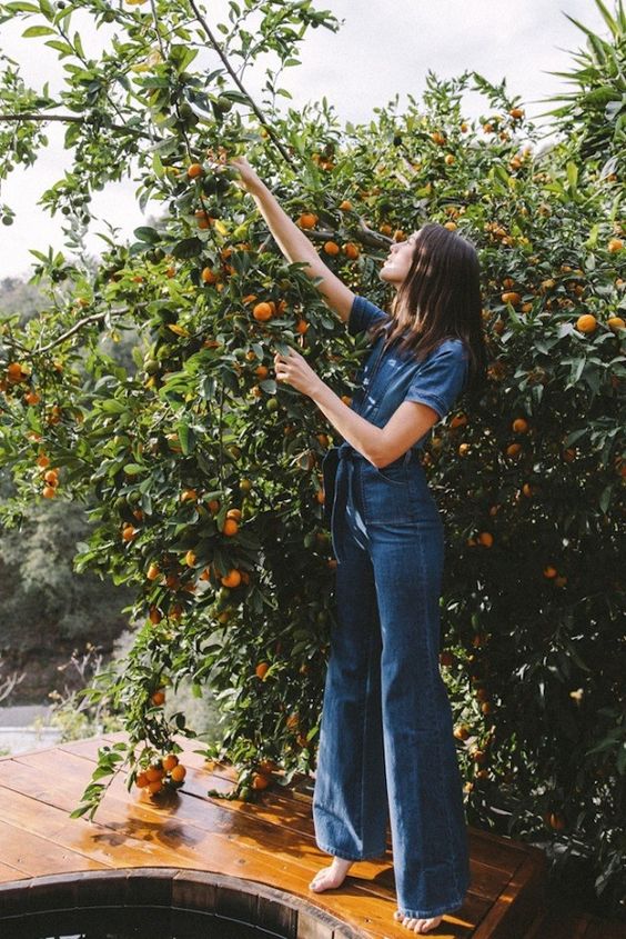 Denim jumpsuit 70's style with flared legs and tie waist | Girlfriend is Better