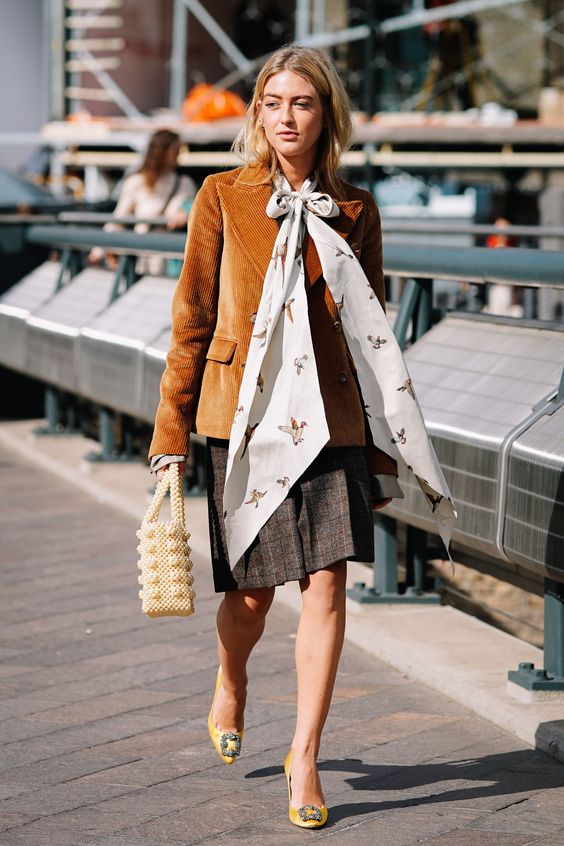 Corduroy blazer with pussy bow tie, plaid skirt, and straw purse | Girlfriend is Better