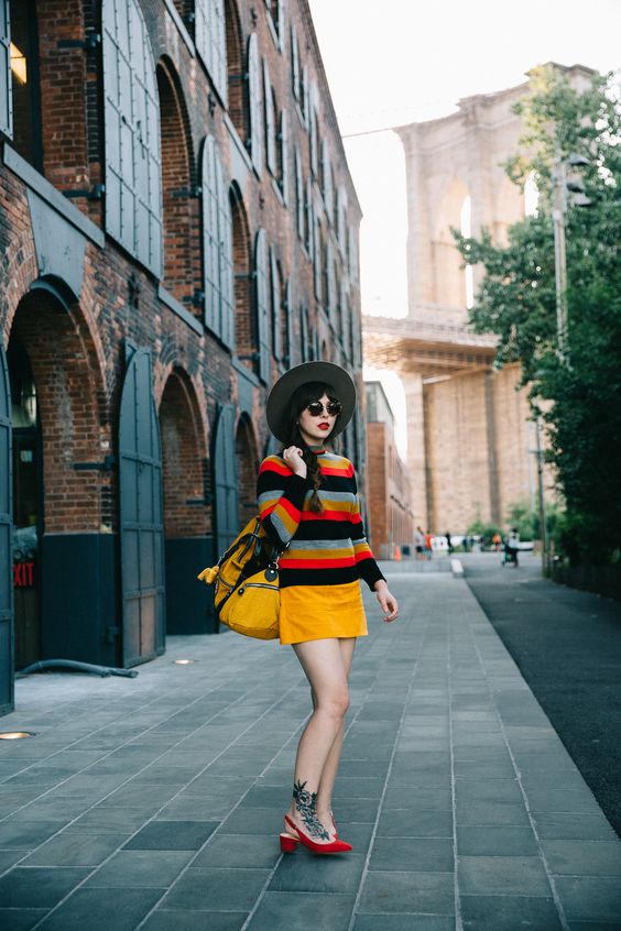 70s inspired yellow corduroy mini skirt and striped sweater | Girlfriend is Better