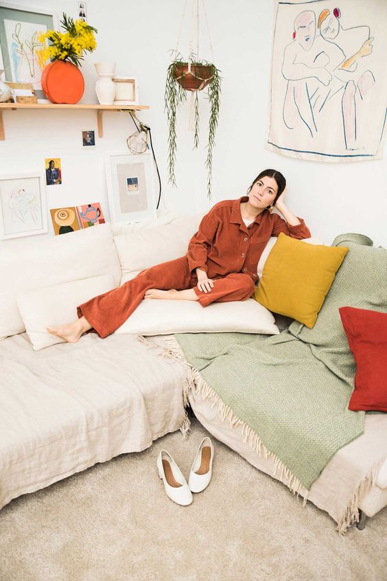 Orange pant suit leisure in plant-filled home | Girlfriend is Better