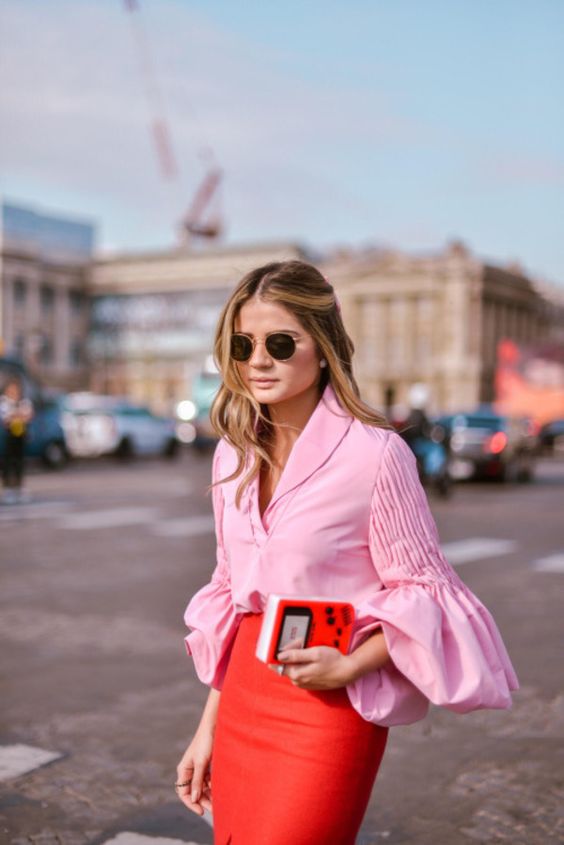 Flared sleeve bells on pink blouse with red skirt | Girlfriend is Better