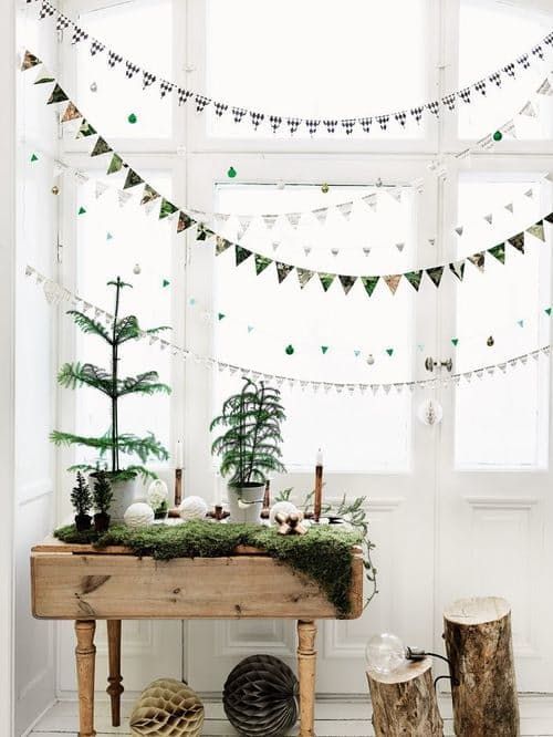 Christmas tree display on a table with banners | Hygge decor ideas | Girlfriend is Better