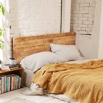 Earth element Feng Shui | yellow bedding, brick walls | Girlfriend is Better