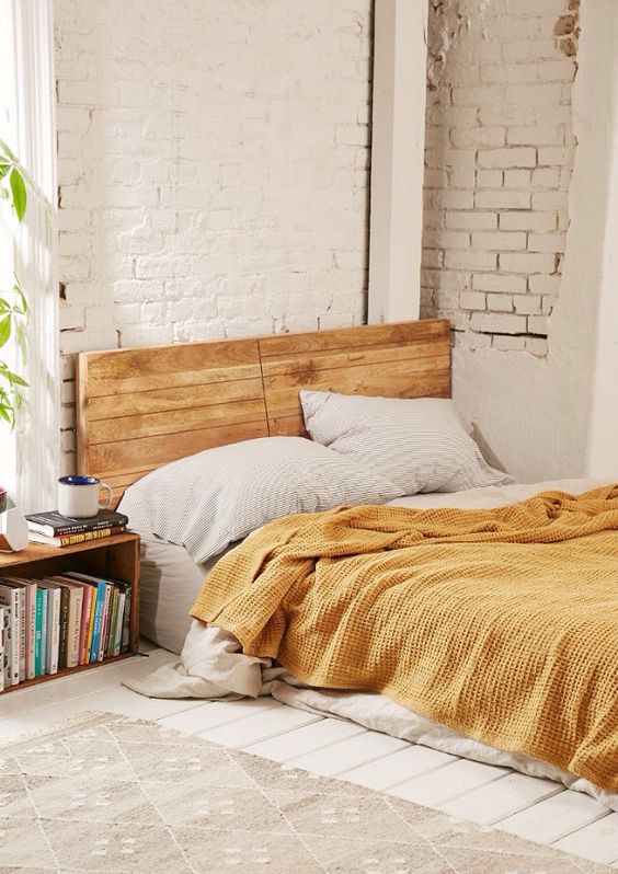 Earth element Feng Shui | yellow bedding, brick walls | Girlfriend is Better