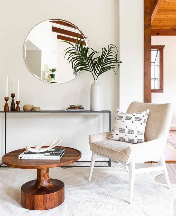 Cancer astrology home decor | Round mirror, white mid-century modern chair | Girlfriend is Better