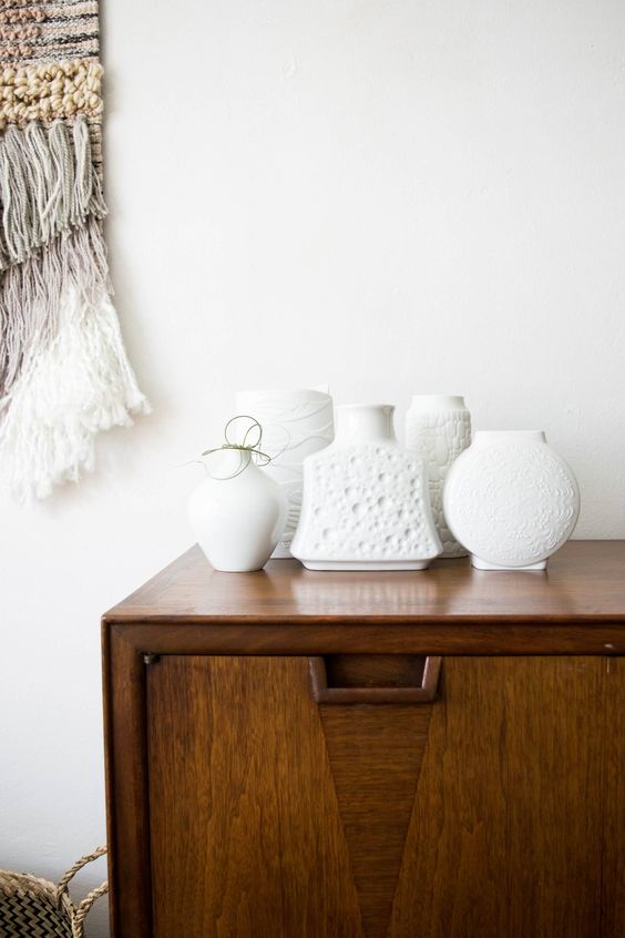 sideboard styling mid-century modern | vintage white contemporary vases | Girlfriend is Better