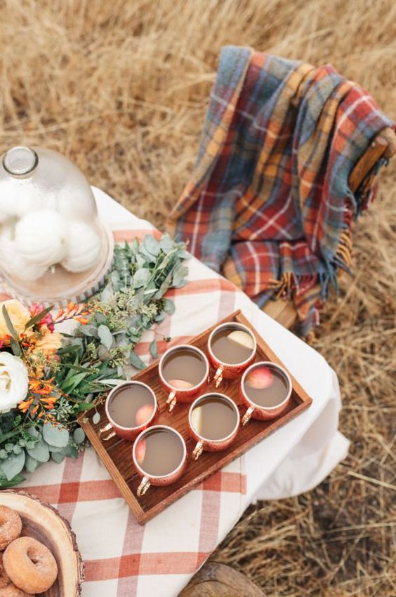 Fall Hygge outdoor tablescape apple cider blanket | Girlfriend is Better