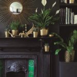 metal element Feng Shui | mid-century modern gold vases plant pottery starburst mirror black fireplace | Girlfriend is Better