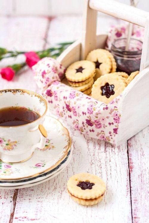 Afternoon Tea | teacup next to jelly filled treats | Girlfriend is Better