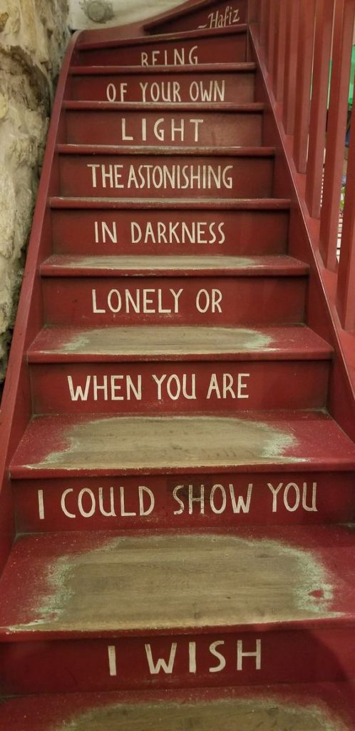 Paris Ground Zero | Shakespeare and Company bookstore red staircase poetry Hafiz | Girlfriend is Better