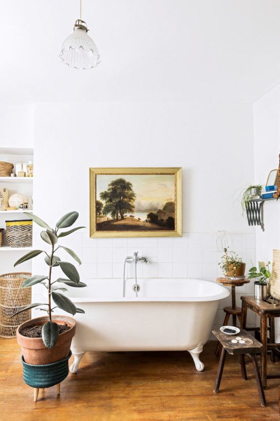 rubber plant | Bohemian decor bathroom claw foot tub terracotta pot | Girlfriend is Better