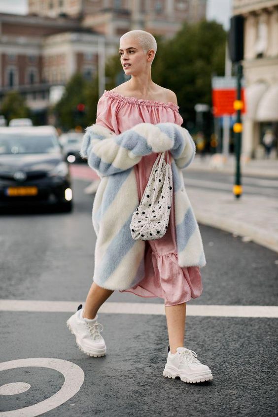 Valentine's Day street style outfits | pink ruffles mumu dress striped faux fur coat white tennis shoes | Girlfriend is Better