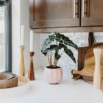 Candlesticks | Bohemian kitchen natural wood cabinets | Girlfriend is Better