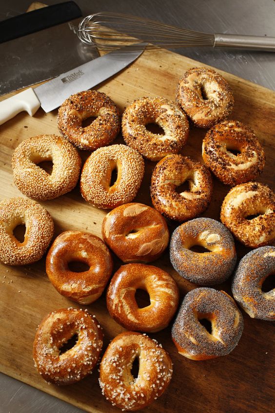 bagel sandwich | baked bread scattered on a table | Girlfriend is Better