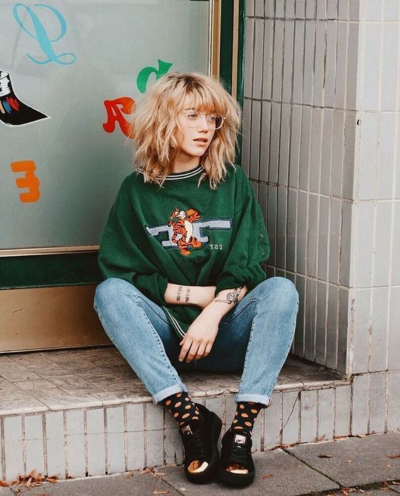 tomboy fashion | vintage green Tigger sweatshirt high-water jeans black tennis shoes | Girlfriend is Better