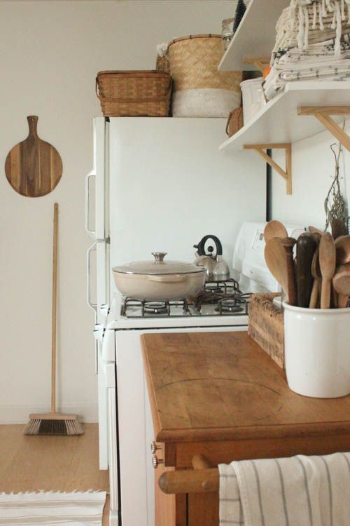 kitchen shelving | wood cabinets organization Spring cleaning baskets containers Hygge | Girlfriend is Better