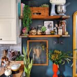 Southern Bohemian | open shelving kitchen dark blue wall paint portrait random person | Girlfriend is Better