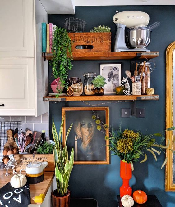 Southern Bohemian | open shelving kitchen dark blue wall paint portrait random person | Girlfriend is Better