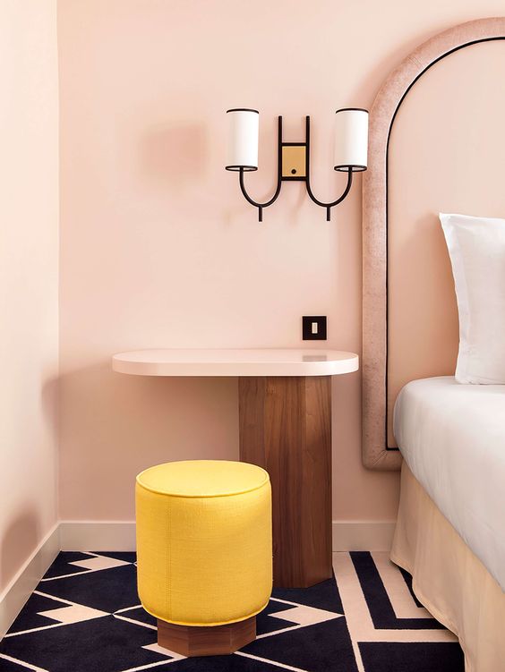 Parisian art deco | pink bedroom wall sconce yellow modern stool graphic tile | Girlfriend is Better