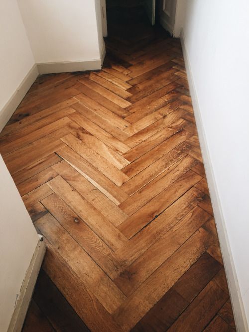 herringbone wood floors | hallway French country Parisian | Girlfriend is Better