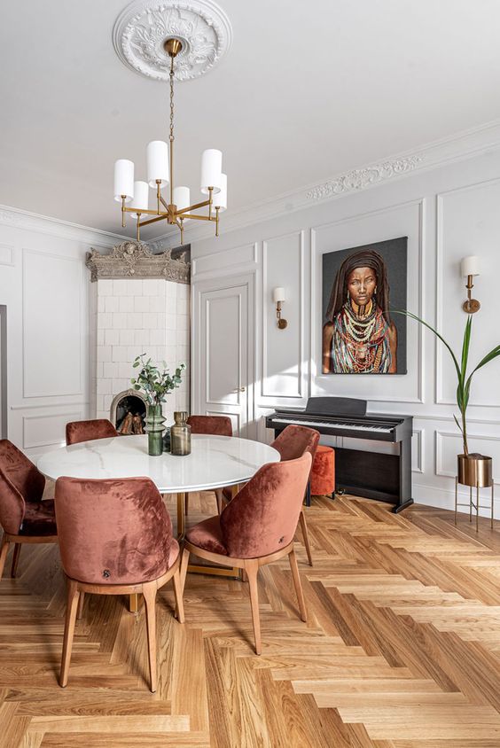 herringbone wood floors | dining room Parisian decor portrait random person upright piano velvet chairs | Girlfriend is Better