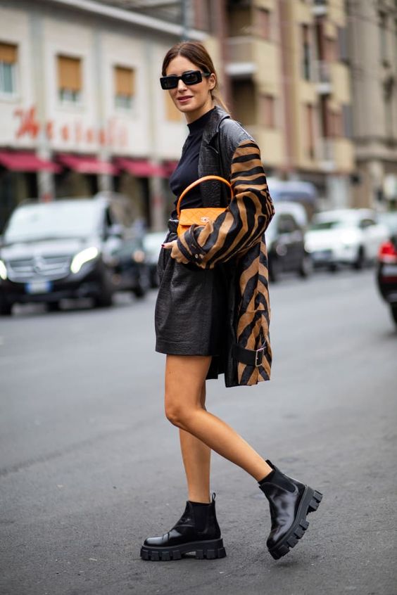 mock necks | winter layers monochromatic black ankle boots zebra animal print jacket sunglasses top handle purse | Girlfriend is Better