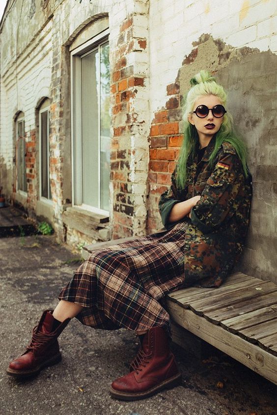 modern grunge | plaid mid-length skirt oversized camouflage jacket maroon work boots 90s fashion inspiration | Girlfriend is Better