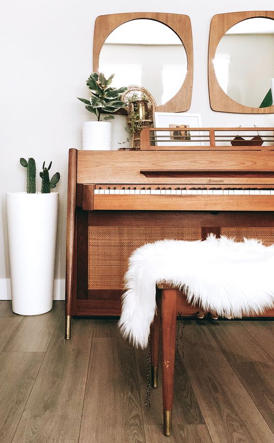 mid-century modern pianos | Baldwin Acrosonic Danish mirrors plants white fur pelt | Girlfriend is Better