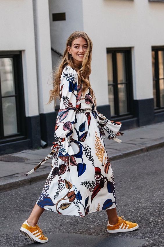 tennis shoes | orange suede Adidas Gazelle floral dress street style | Girlfriend is Better