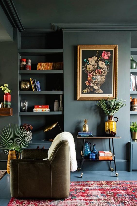 built-in bookshelves | French country dark wall paint vintage area rug fat lava glazed pottery | Girlfriend is Better