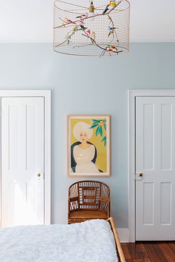 displaying art | bedroom horseshoe chair rattan Southern Bohemian | Girlfriend is Better