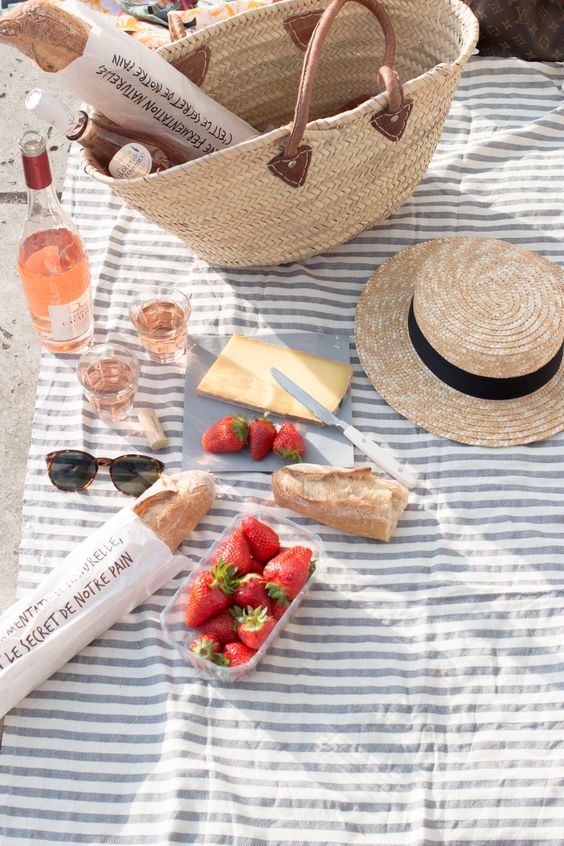 Spring picnic | baguette strawberries cheese wine straw hat purse | Girlfriend is Better