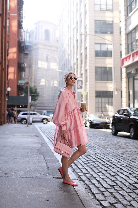 balloon sleeves | pink ruffled party dress street style tiered ruffles top handle purse flats | Girlfriend is Better