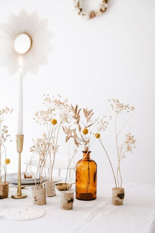 hygge tablescapes | vintage amber glassware bottle candlestick sunburst mirror wildflowers | Girlfriend is Better