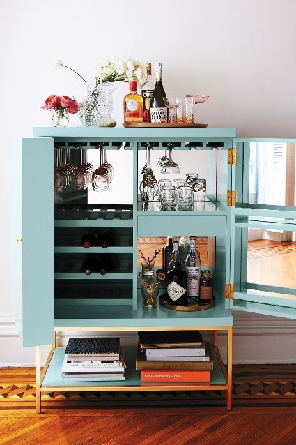 bar cart styling | lacquered cabinet mirror panels glassware liquor tray | Girlfriend is Better