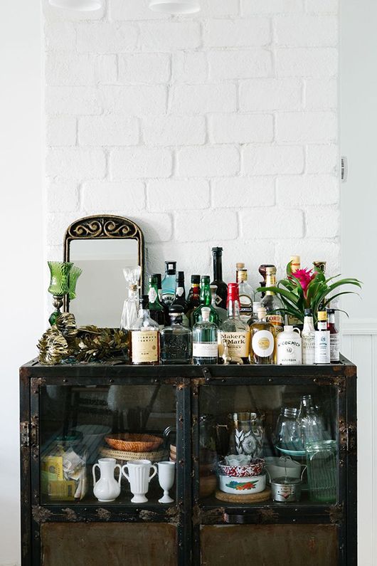 bar cart styling | vintage Bohemian eclectic Spanish style mirror bitters liquor | Girlfriend is Better