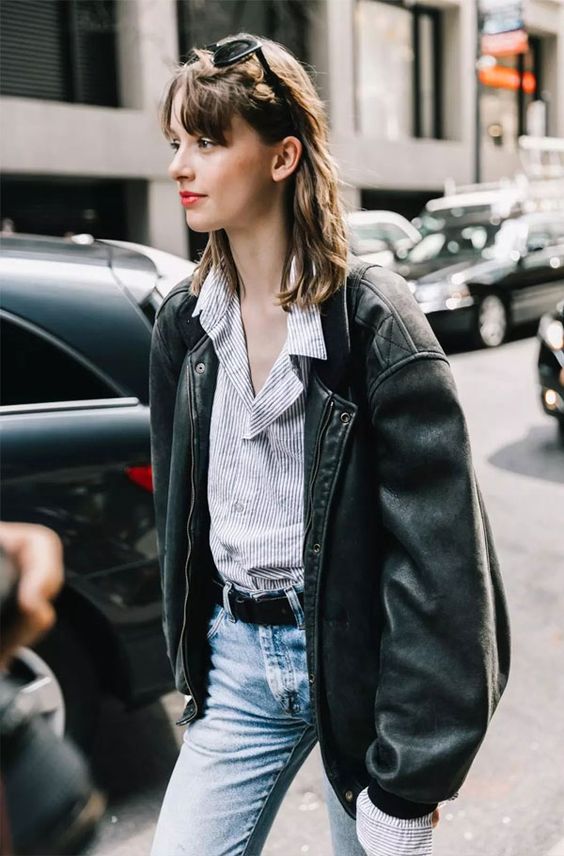 oversized menswear | leather jacket chambray button up blouse denim jeans business casual French girl cool | Girlfriend is Better