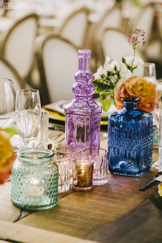 table settings Bohemian eclectic | vintage colored bottles candles centerpiece summer entertaining | Girlfriend is Better