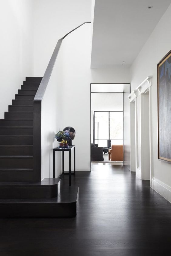 black floors | entryway dark staircase modern elegance | Girlfriend is Better