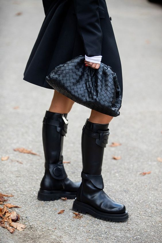 chunky black boots | winter street style knee-high oversized clutch | Girlfriend is Better